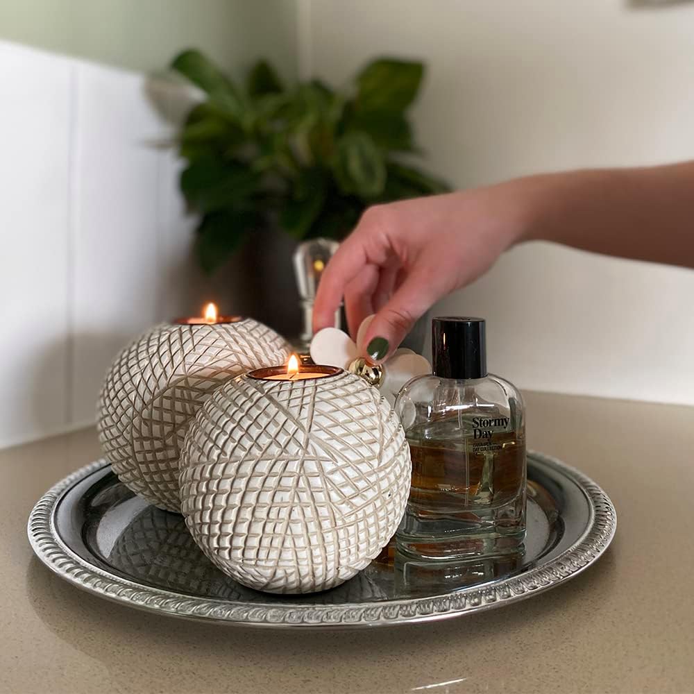 Capture the moment with our elegant Luca Orb Candle Holder Set